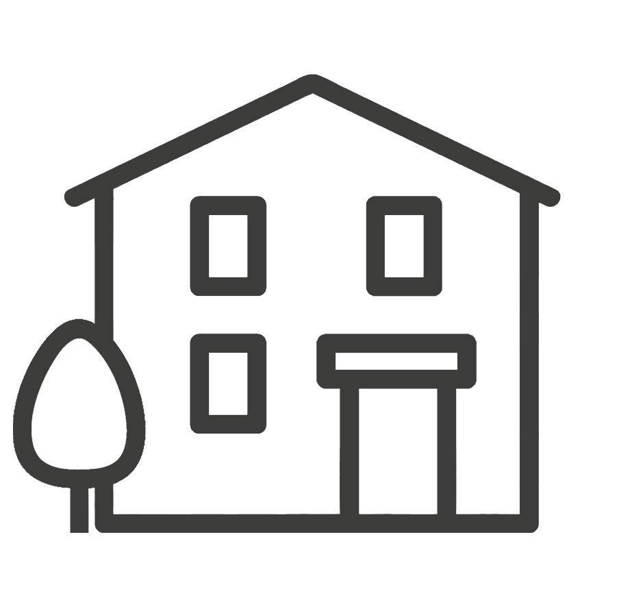 Miniatura de un edificio con un árbol al lado izquierdo.